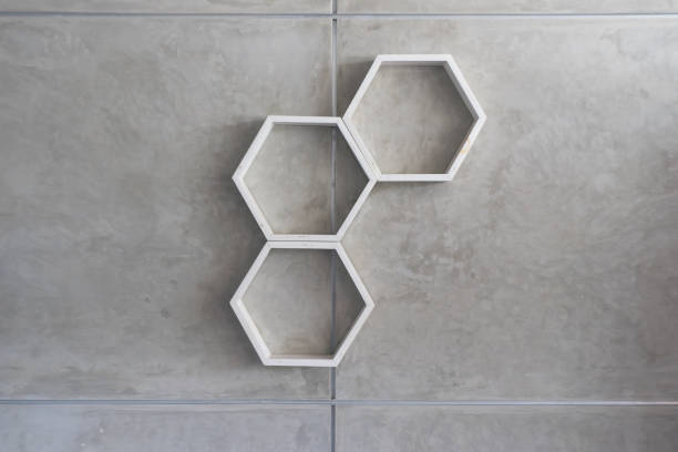 istock Hexagonal white painted wall decoration on industrial style wall 1586946465