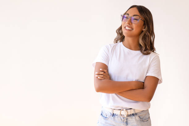 istock Young laughing woman standing 1586946982