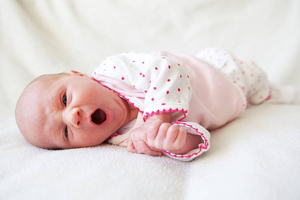 istock Yawning Newborn baby 158696373
