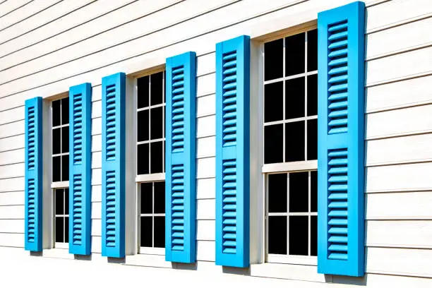 Photo of Blue Wooden Shuttered Windows