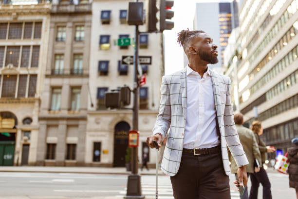 istock Affluent black businessman on a trip to NYC 1587006148