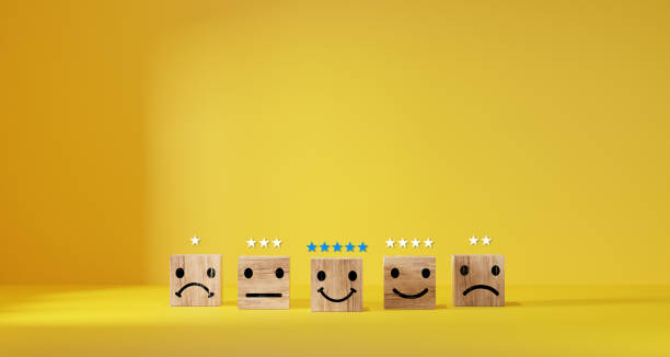 istock customer services best excellent business rating experience. Satisfaction survey concept. Hand of a businessman chooses a smiley face on wood block cube. 5 Star Satisfaction 1587043762