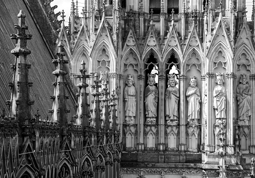rooftop and sculpted towers of Reims cathedral
