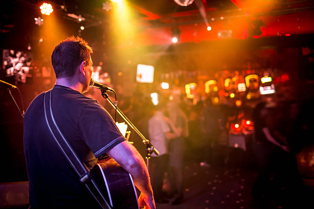 istock musician plays a guitar 158706530