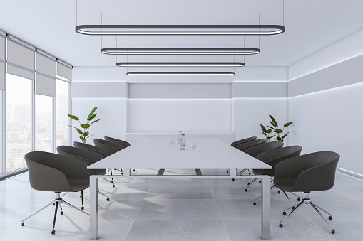 Modern grey meeting room interior with office desk and chairs, panoramic window with city view, concrete floor and white walls. 3D Rendering