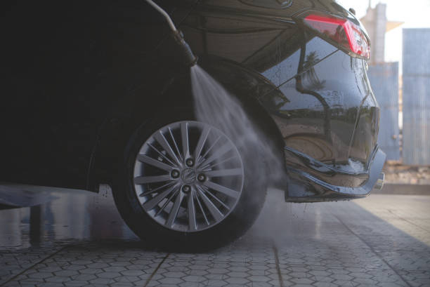 istock Car washing cleaning car using high pressure water background 1587116300