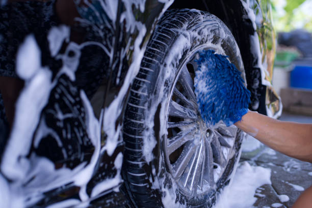 istock Car washing cleaning car using high pressure water background 1587117473
