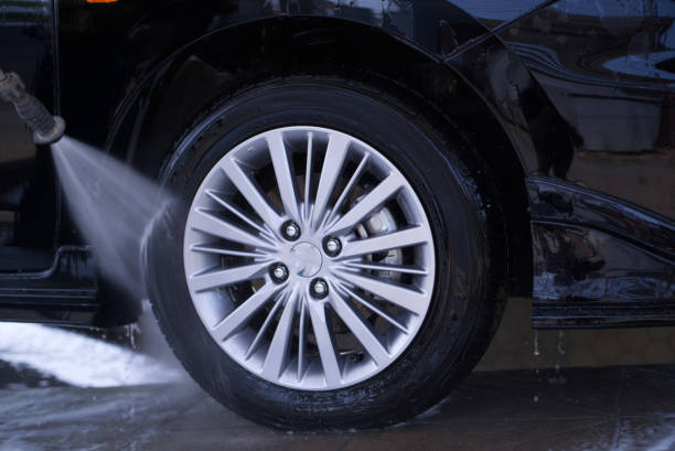 istock Car washing cleaning car using high pressure water background 1587118027