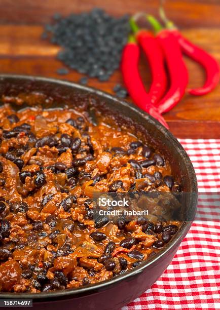 Chili Con Carne With Black Beans And Red Peppers Stock Photo - Download Image Now - Black Bean, Chili Con Carne, Chili Pepper