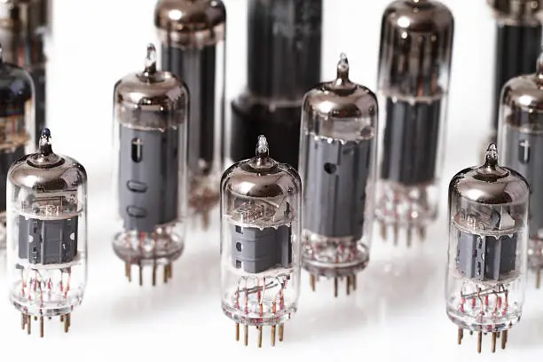 Glass vacuum radio tubes.  Isolated image on white background