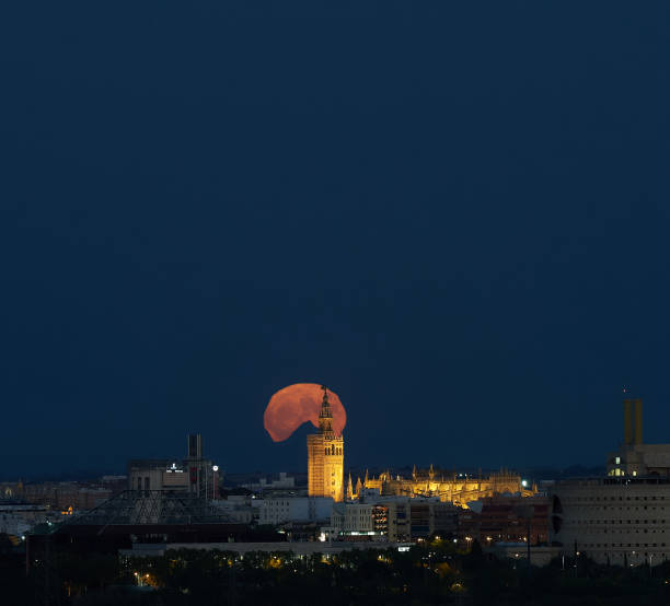 istock Glowing Elegance: Supermoon Serenade at Giralda Tower, Seville 1587171084