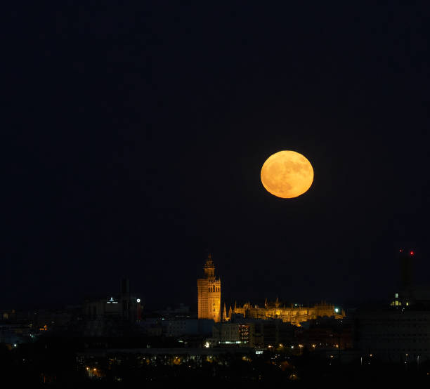 istock The Majestic Super Moon Over Giralda Cathedral 1587171092