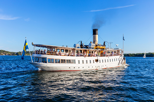 Vaxholm, Sweden, August 14., 2022 - Steamship at Archipelago island of Vaxholm