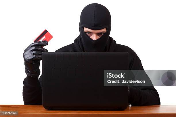 Online Theft Stock Photo - Download Image Now - Dishonesty, Laptop, Credit Card