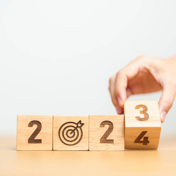 istock 2023 year change to 2024 year block with dartboard icon. Goal, Target, Resolution, strategy, plan, Action, mission, motivation, and New Year start concepts 1587179067