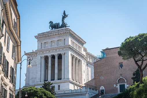 Altar of the Fatherland in Rome, Italy with blue sky, sun and shadows