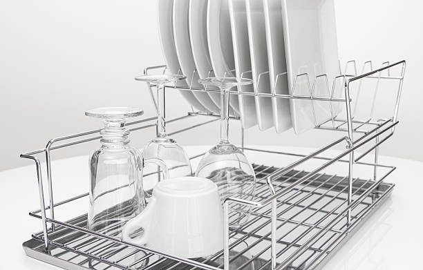 istock Metal dish rack with dishes and glasses 158720377
