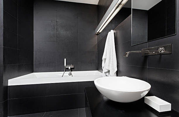 Modern minimalism style bathroom interior in black and white tones stock photo