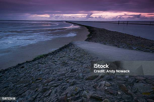 Sonnenuntergang In East Frisia Beach Stockfoto und mehr Bilder von Abenddämmerung - Abenddämmerung, Bunt - Farbton, Damm - Hergestellter Gegenstand
