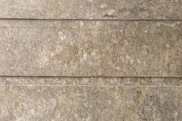 istock Granite stone wall detail texture 1587237289