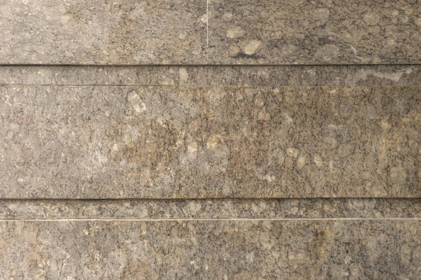 istock Granite stone wall detail texture 1587241500