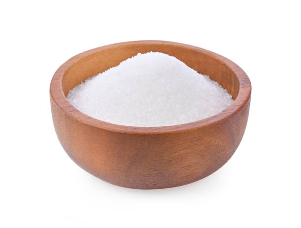 istock White sugar in wooden bowl on white background 1587250195