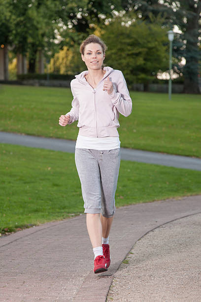 istock Woman is jogging 158728416