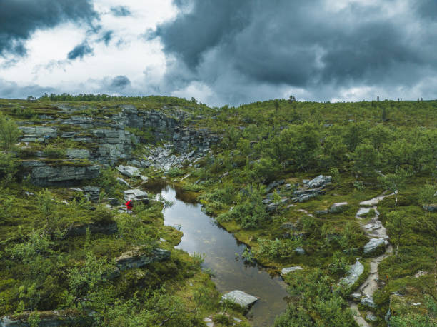 Evagraven is a famous canyon located near the city of Funasdalen in Harjedalen, north Sweden. Named after the woman Eva who died in a snowstorm when walking across the steep edge by accident.