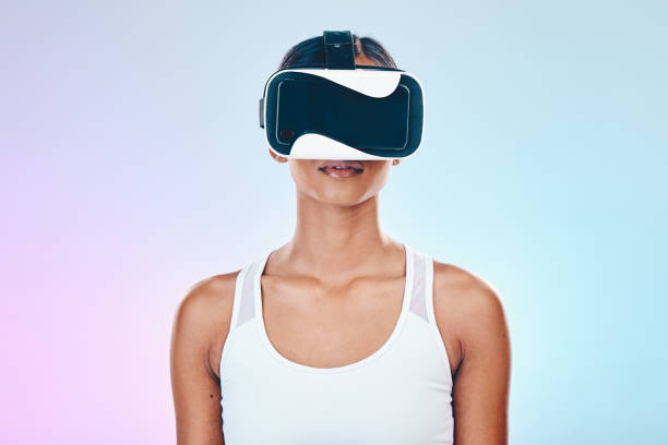 istock Virtual reality, glasses and woman vision isolated on studio, gradient background for metaverse, high tech or cyber gaming. VR, digital world and young person in 3d user experience or online software 1587315241