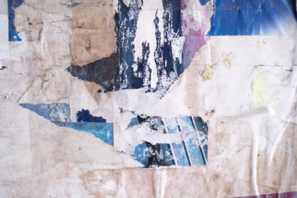 istock Torn and ripped street poster background, abstract old paper collage 1587328337