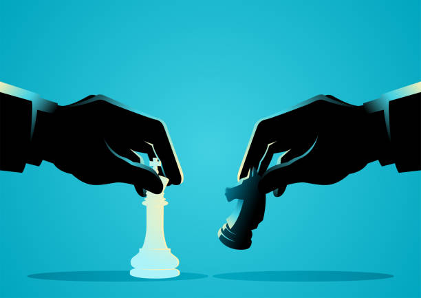 istock Business concept of businessmen playing chess, featuring a king chess piece against a knight chess piece 1587334739
