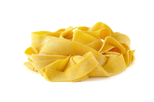 Pappardelle, italian egg pasta, isolated on white