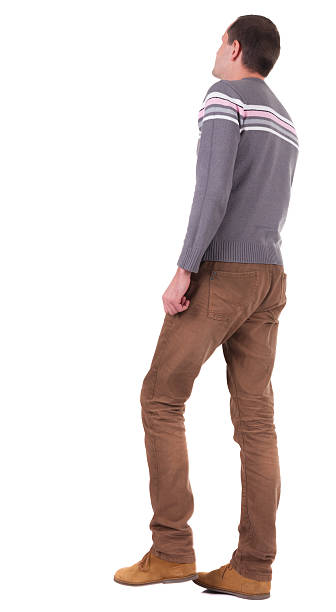 istock Back view of going  handsome man in sweater 158735392