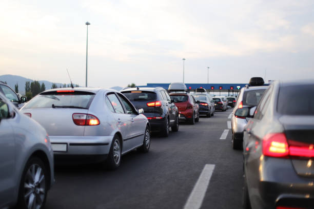 istock Cars on the road, border checkpoint 1587376513