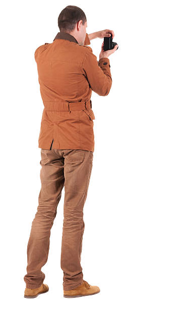 istock Back view of man photographing 158739111