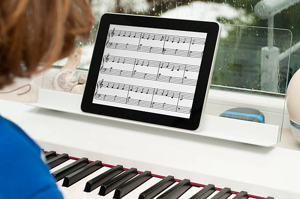 Digital tablet come foglio di musica - foto stock