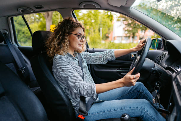 istock Young Woman Driving A Car 1587408228
