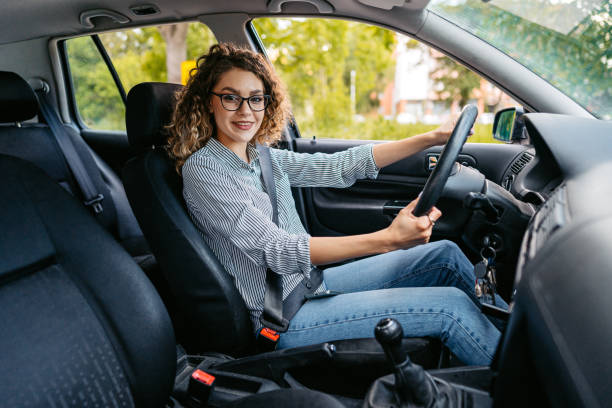 istock Young Woman Driving A Car 1587418896
