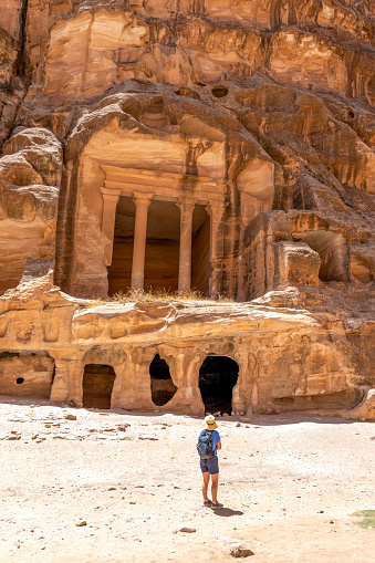 Little Petra is an archaeological site located north of Petra and the town of Wadi Musa in the Ma'an Governorate of Jordan. Like Petra, it is a Nabataean site, with buildings carved into the walls of the sandstone canyons. As its name suggests, it is much smaller, consisting of three wider open areas connected by a 450-metre (1,480 ft) canyon. It is part of the Petra Archeological Park, though accessed separately, and included in Petra's inscription as a UNESCO World Heritage Site.