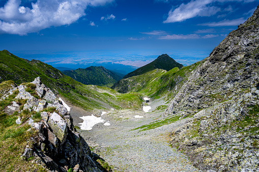 Summer landscape of the Fagaras Mountains, Romania. A view from the hiking trail near the Balea Lake and the Transfagarasan Road.