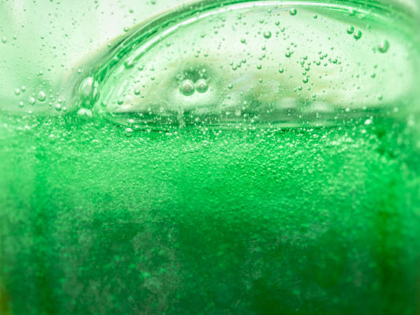 istock closeup of bubbles in a thick green liquid 1587447932