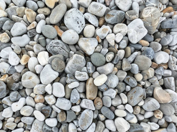 Pebbles of different sizes, shapes and colors.