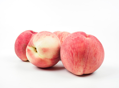 Peach. Slice of fruit isolated on white.