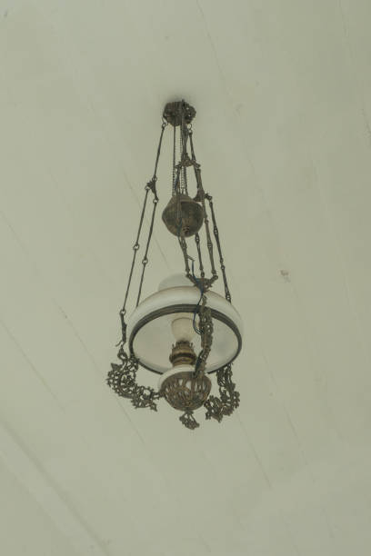 istock Vintage old style ceiling lamp dutch colonial design Java island Indonesia 1587470253