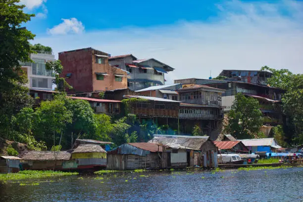 Boat trip on the Rio Itaya and view on the poorest part of Iquitos