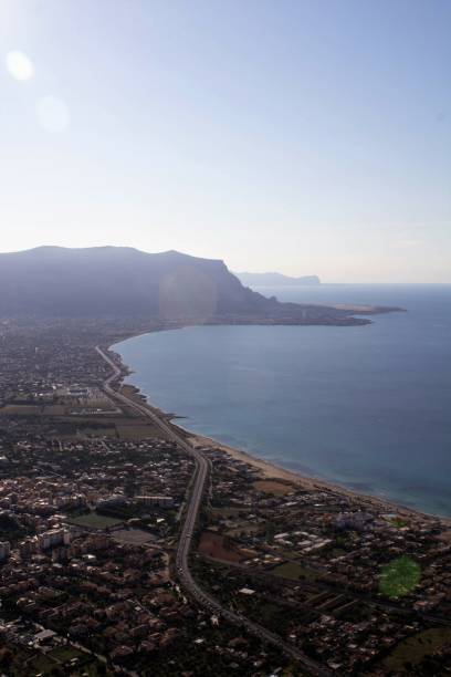 istock maritime coast with promontory on the background in Sicily, Italy 1587513392