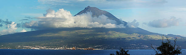 Volcano Pico, Azores - Panorama Panoramic image of Volcano Mount Pico at Pico island  Azores - view from Pedro Miguel, Faial island madalena stock pictures, royalty-free photos & images