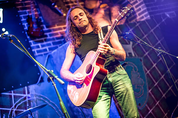 istock musician plays a guitar 158751955