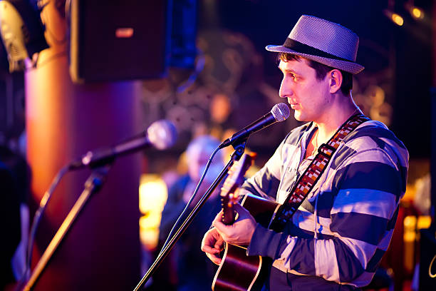 istock musician plays a guitar 158752045