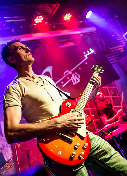 istock musician plays a guitar 158752047